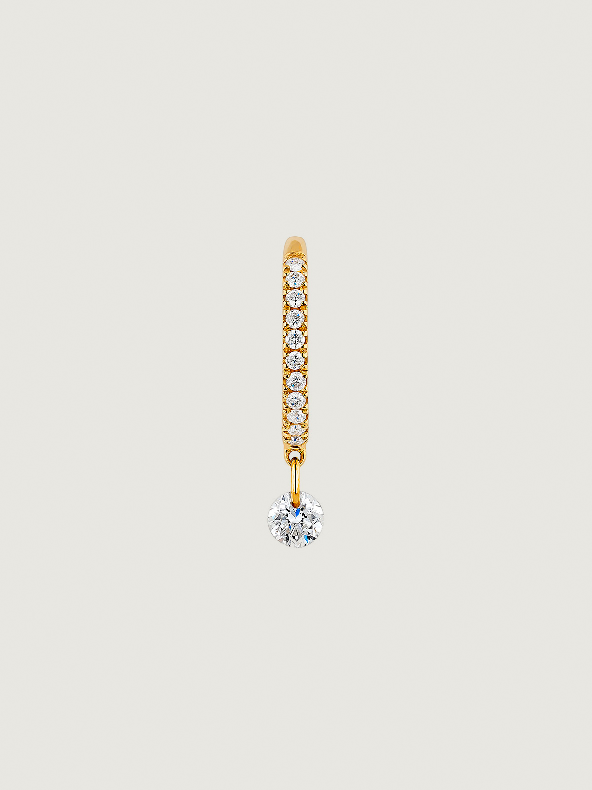 Individual small hoop earring of 18K yellow gold with diamonds.