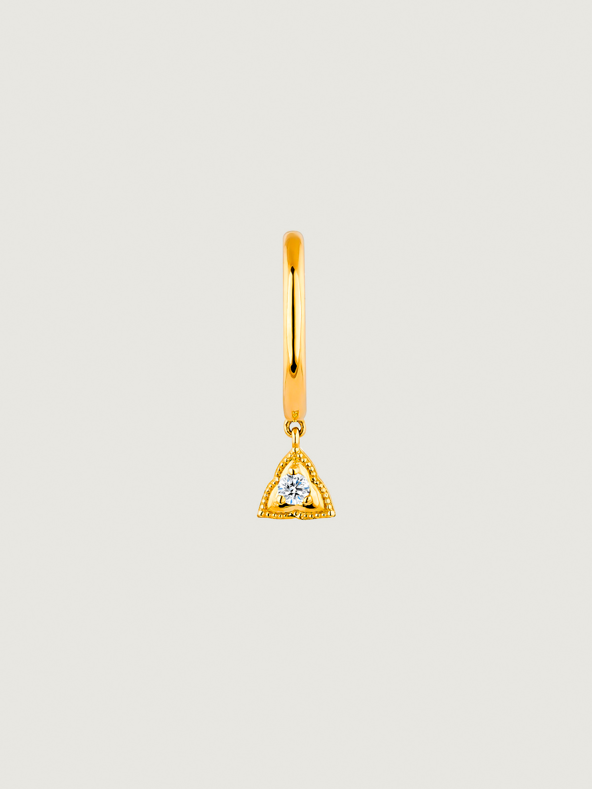 Individual 9K yellow gold hoop earring with triangle and white topaz.