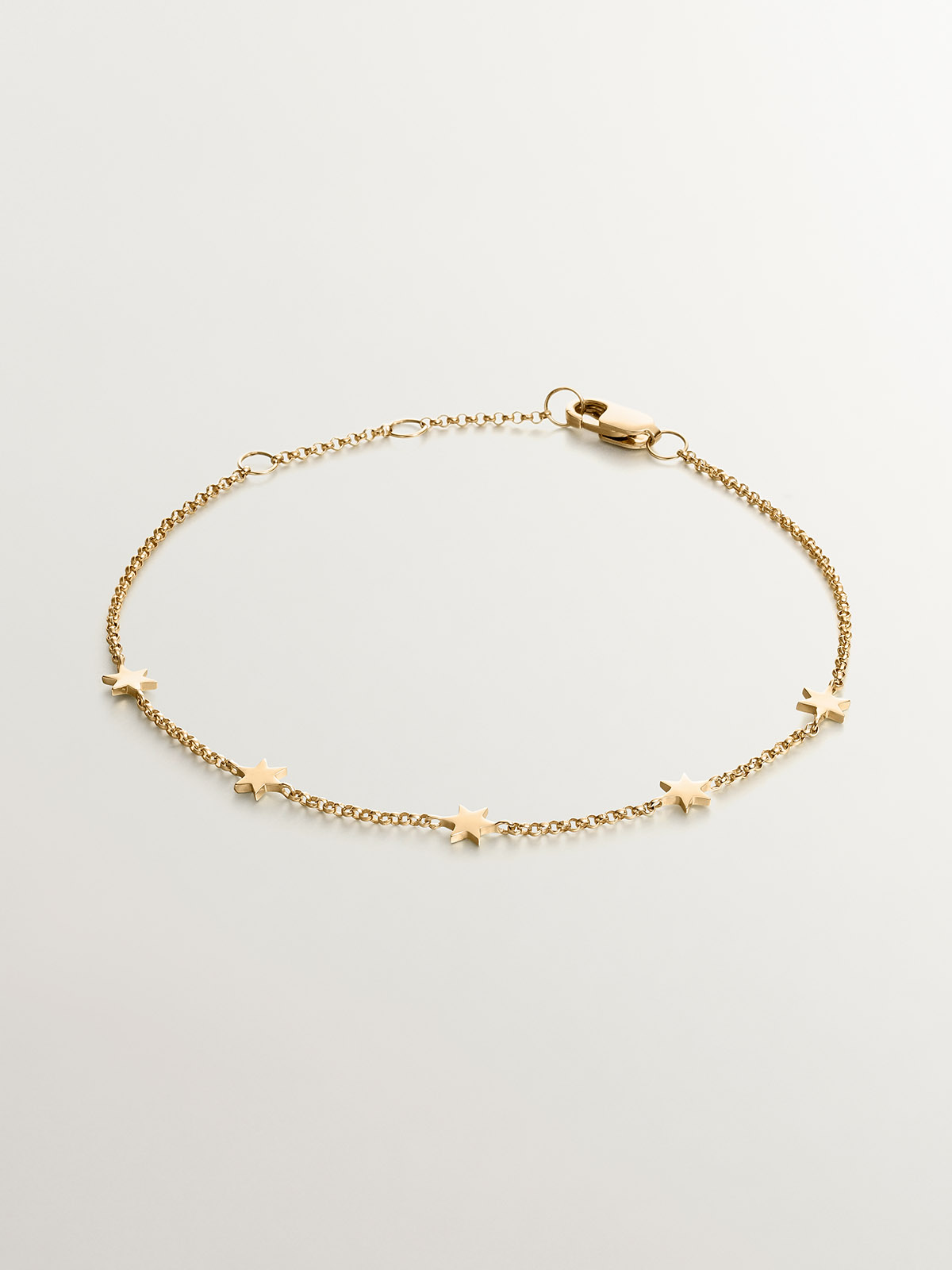 925 Silver bracelet bathed in 18K yellow gold with stars.