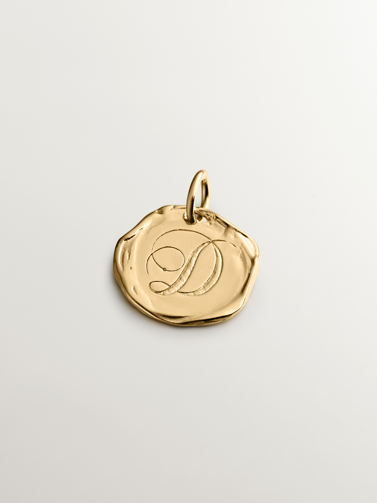 Handmade 925 silver charm plated in 18K yellow gold with initial D
