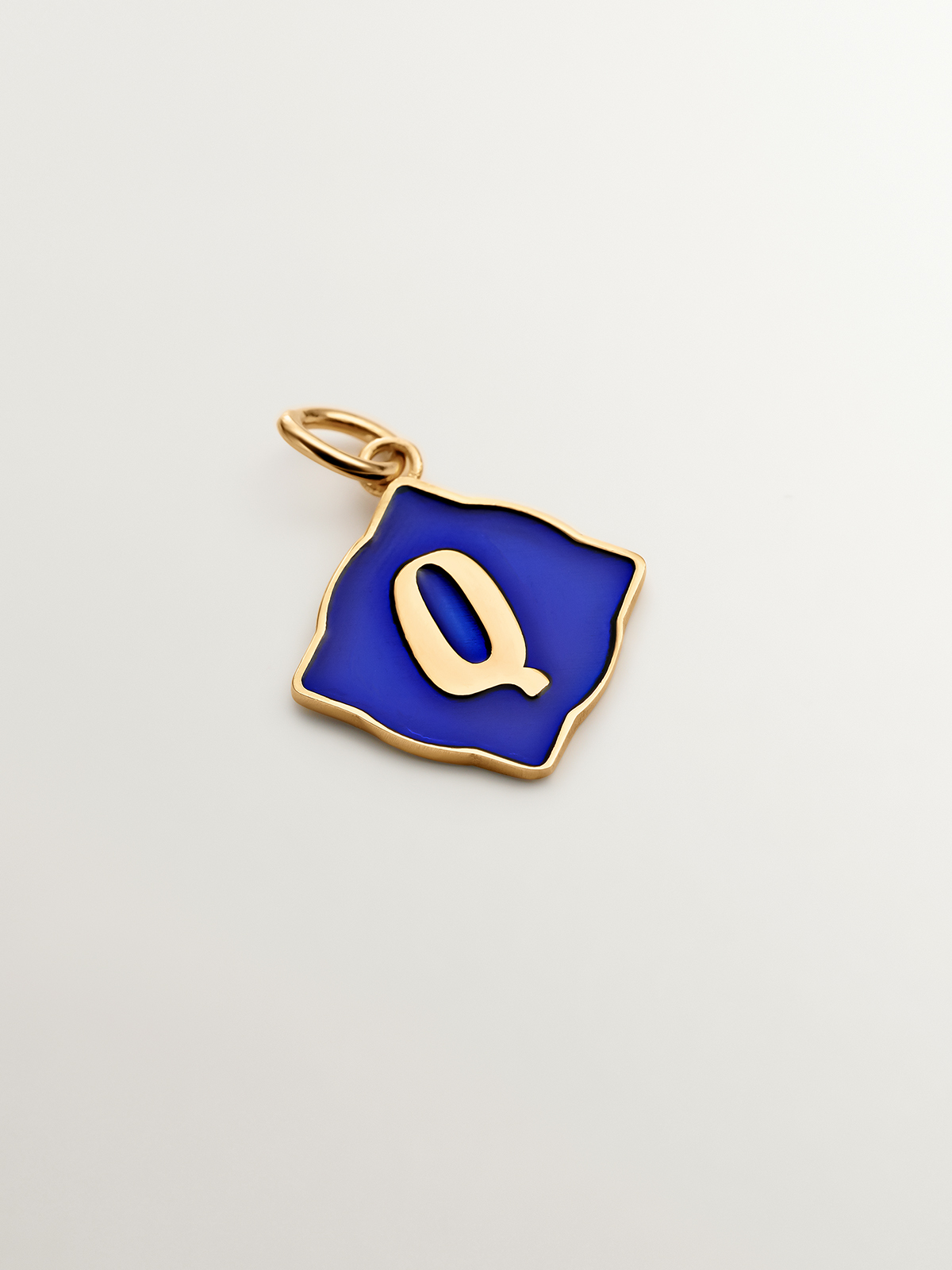 18K yellow gold plated 925 sterling silver charm with initial Q and blue enamel with irregular diamond shape