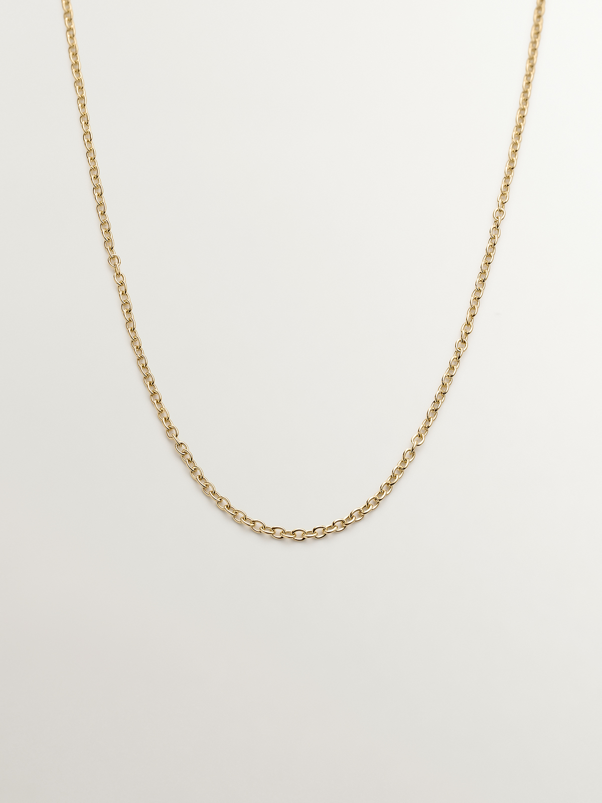Fine rolo link chain in 9K yellow gold